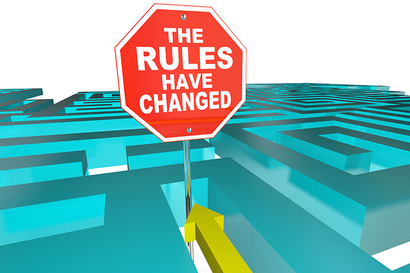 Stop sign reading: The Rules Have Changed